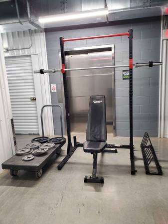 Photo Olympic Squat Rack with Weight Bench, Bar and Weights $800