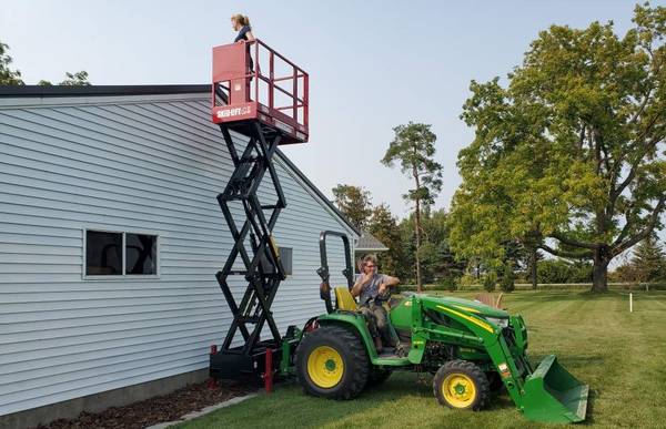 Photo Scissor Lift for Skid Steer and Tractors, Skid-Lift $1