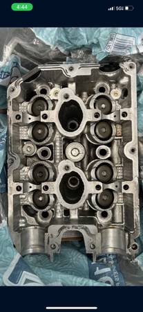 Photo 04-06 STi EJ257 B25 RH OEM cylinder head - cracked spark plug holes - sold as-is $100