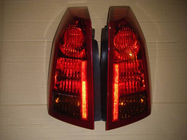 Photo 2003  2007 Cadillac CTS Tail Light Assembly $45