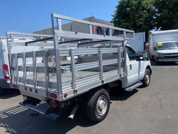 Photo 2013 FORD F-250 SD 6.2L, Gas SRW 8 FT STAKEBED Truck $19,995