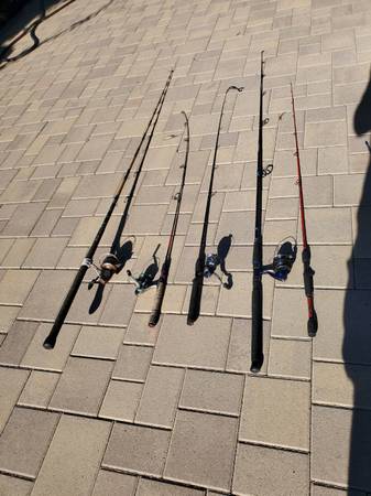 Photo 5 Different Fishing Poles $30