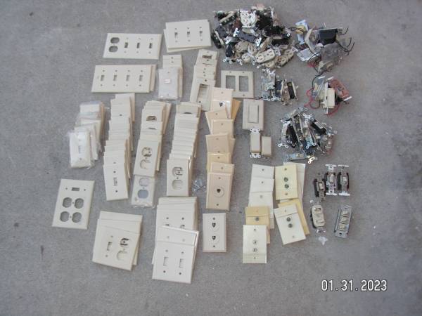 Photo Assorted 194 Electrical Switch Plates and Switches, ivory new and used $5