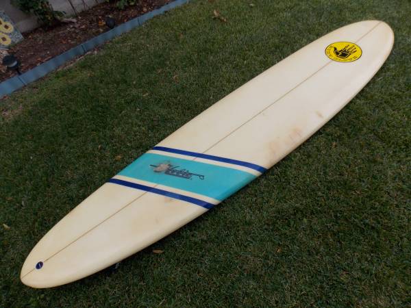 Photo Hobie Longboard Surfboard and Dakine Bag $225