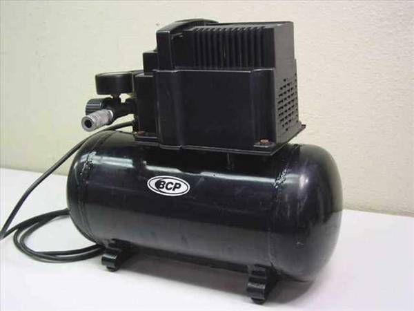 Photo Mini Air Compressor with hose $40