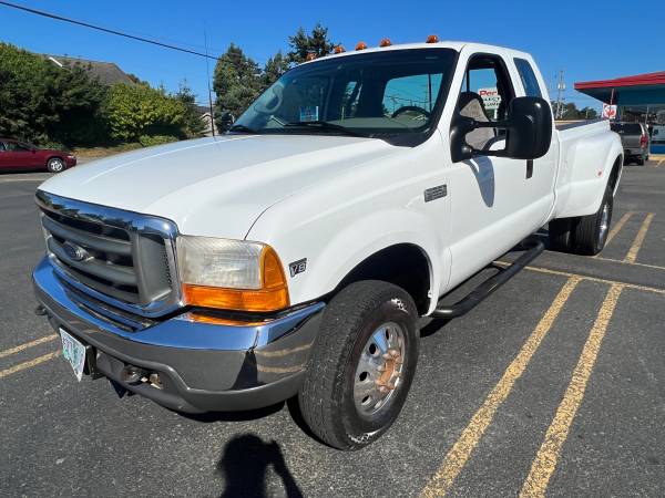 Photo 1999 FORD F350 7.3L extended cab long bed dually $13,500