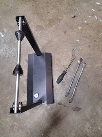 Photo Motorcycle balancer stand and tire lever tools $30