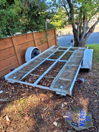 Photo low side by side, small car trailer $1,000