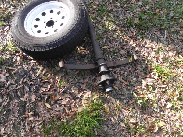 Photo 3.5k trailer axle complete springs wheels, 2057515 tires, new spare $310