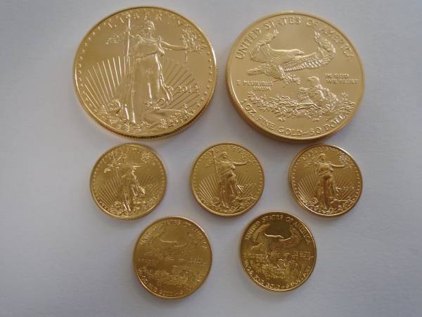 Photo Buying Gold American Eagle Coins 12 oz  $1010 and 1 oz  $2015