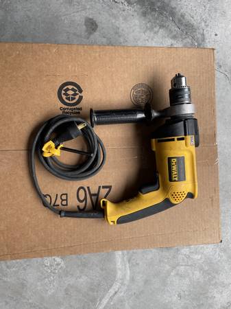 Photo DEWALT 7.8 Amp Corded 12 in. Variable Speed Reversible Hammer Drill $90