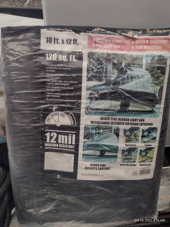 Photo TARP 10 ft. x 12 ft. Silver and Black Extreme-Duty, Weather-Resistant $10