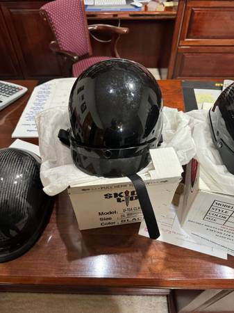 Photo Helmets New and Almost New $50