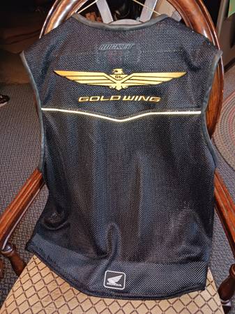 Photo Gold wing vest $20