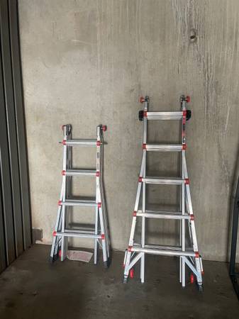 Photo One story and two story folding ladders $350