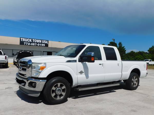 Photo 2011 FORD F250 LARIAT  181K MILES  4X4  CREW CAB  CLEAN CARFAX - $29,995 ( NO DOC FEES )
