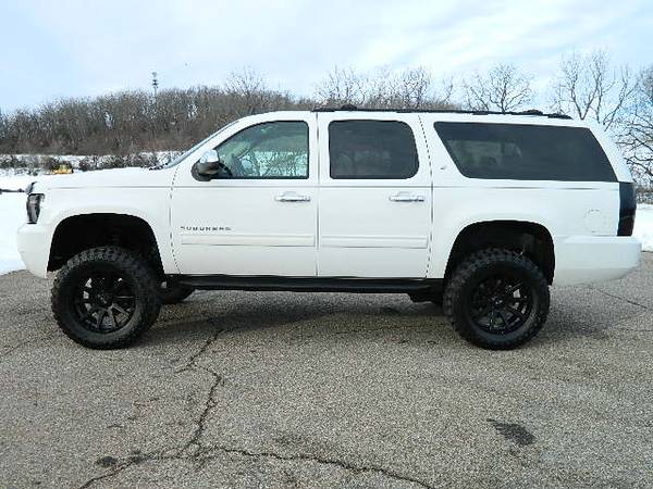 Photo 2014 CHEVROLET SUBURBAN LIFTED 4X4 - $24,995 (FINANCING AVAILABLE)