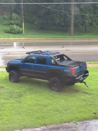 2003 chevy avalanche lifted