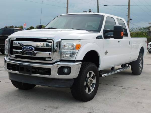 Photo 2012 FORD F350  FX4 LARIAT  4X4  DIESEL  LONG BED  CREW CAB  - $36,995 ( NO DOC FEES )